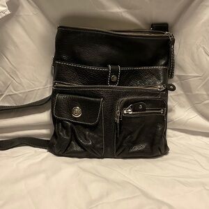Roots black leather handbag.